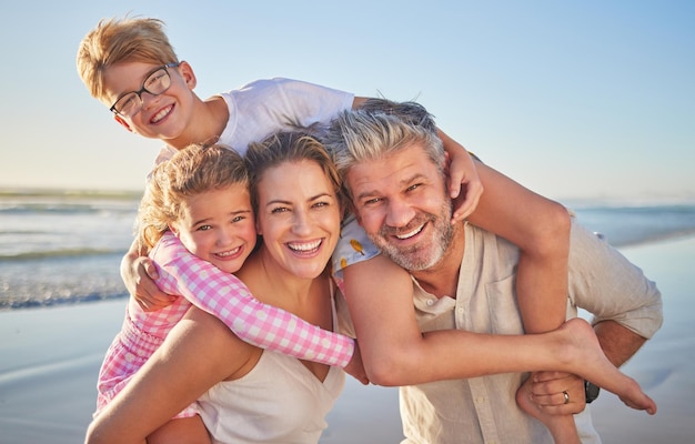 Family beach and happy kids with quality time together on a summer vacation travel in the sun Happiness of mother man and children portrait in sunshine with a smile hug and fun in nature