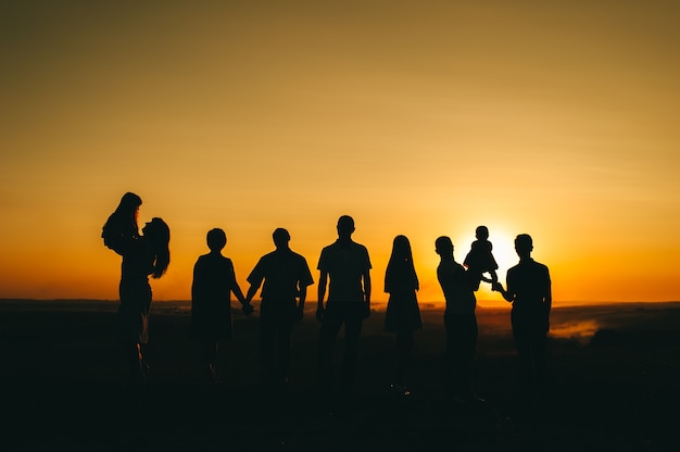 family and beautiful sunset