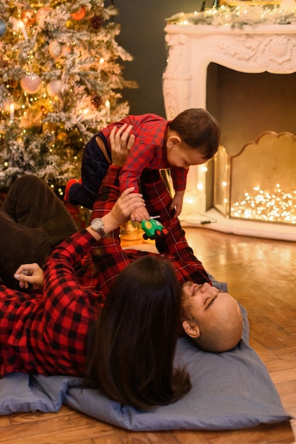 Family in Christmas decorations