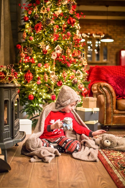 Family In Christmas Socks Near Fireplace