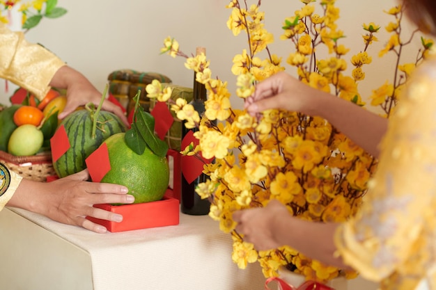 Family Decorating Apartment for Tet