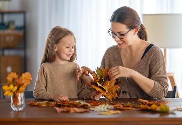 Family doing autumn decor