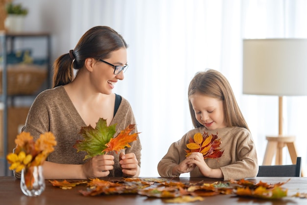 Family doing autumn decor