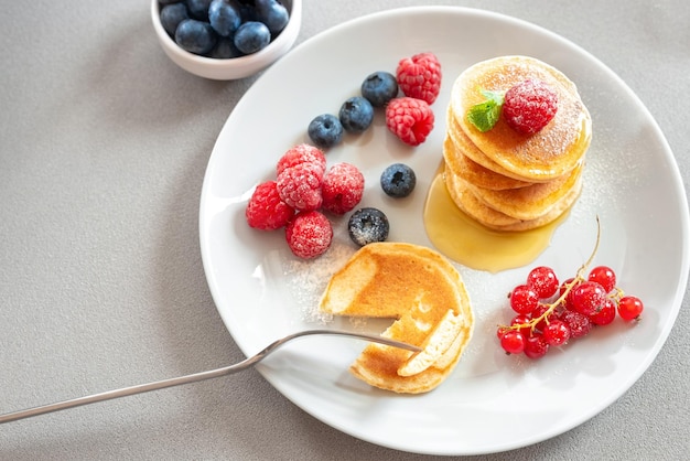 Family eating pancakes for breakfast food for breakfast healthy eating homemade pancakes on a white