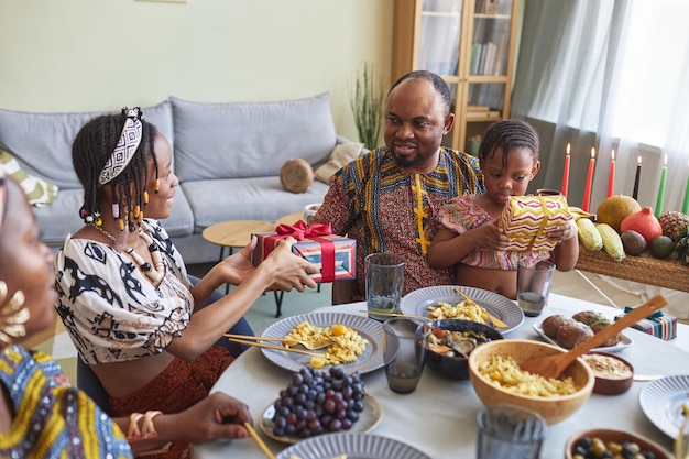 Family giving presents during holiday