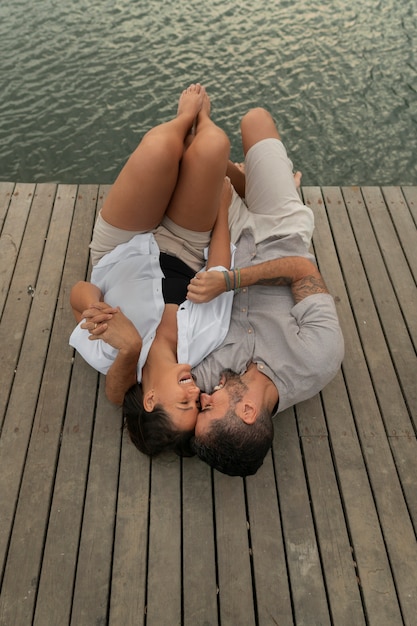 Family hanging out on a jetty