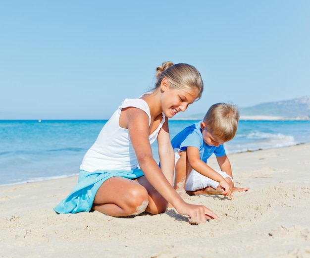 Family having fun on beach