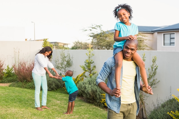 Family having fun in the garden 