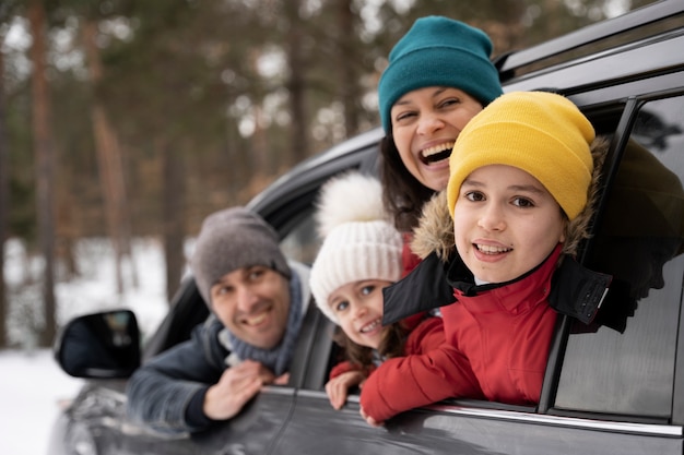 Family having fun during winter roadtrip