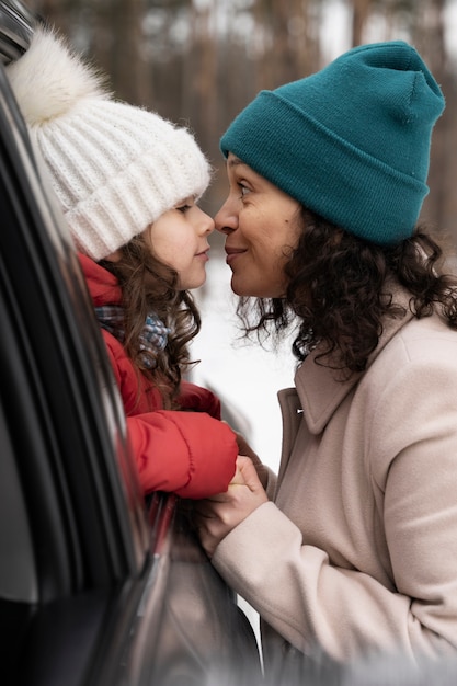 Family having fun during winter roadtrip