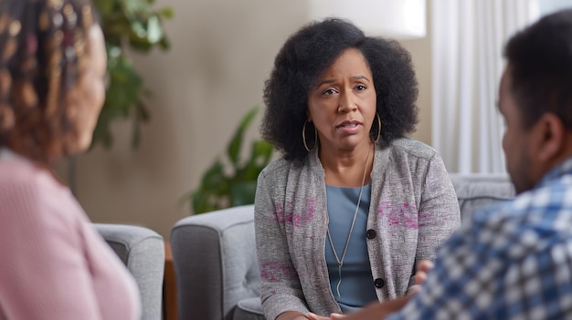 Photo family intervention scene with loved ones expressing concern illustrating the collective effort to address addiction