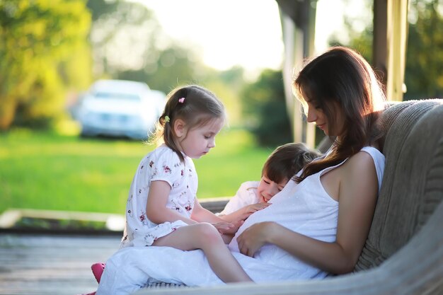 The family is resting in nature Vacations in the fresh air Weekend children play in the park