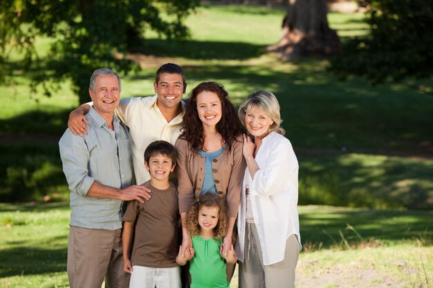 Family looking at the camera in the park