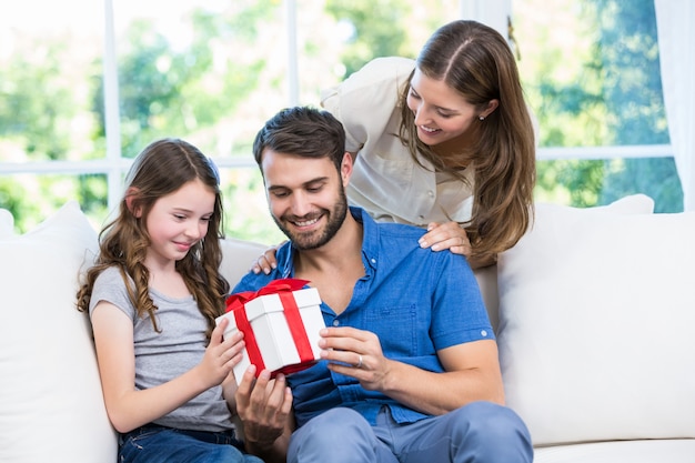 Family looking at gift 