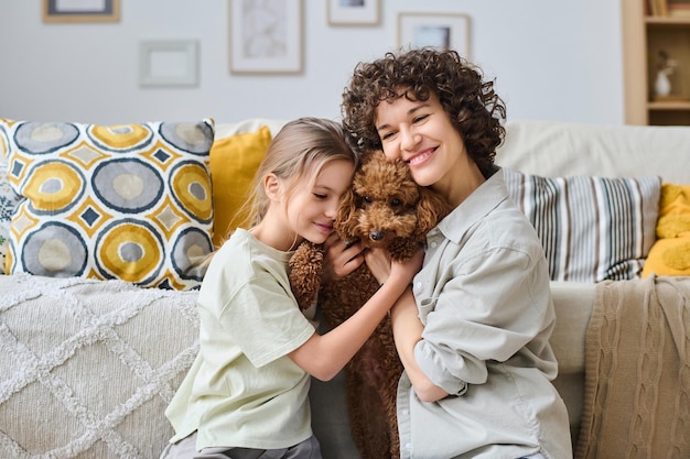 Family loving their cute pet