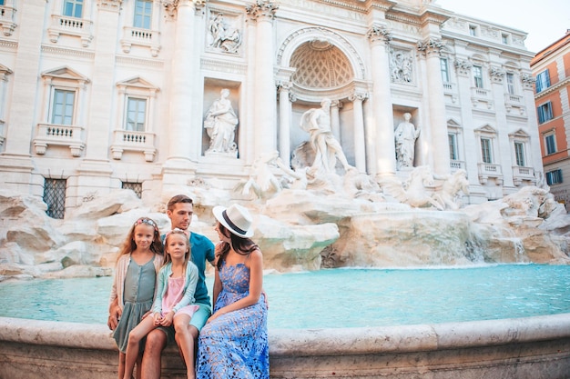 Family near fontana di trevi rome italy