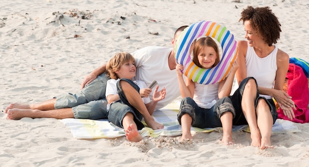 Family playing with the sand