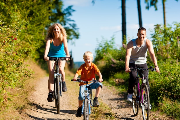 Family riding bicycles for sport