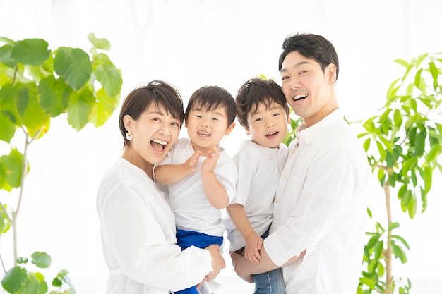 Family taking a commemorative photo with a smile