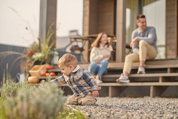 Family of three people in the countryside