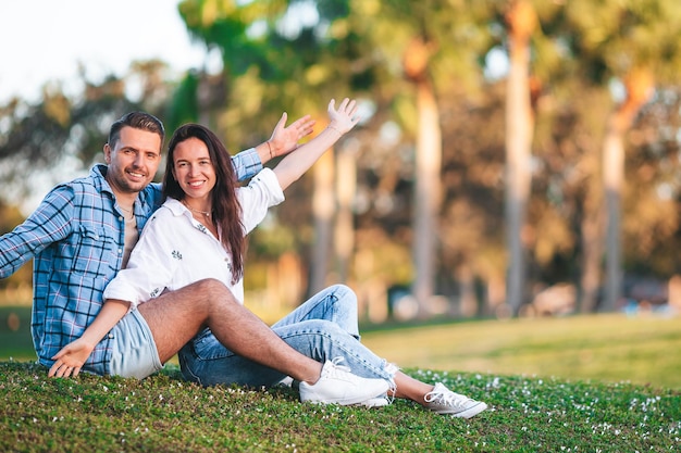 Family of two in the park on summer day outdoors