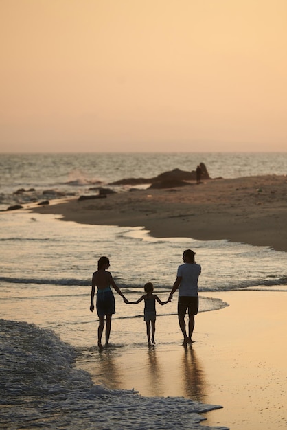 Family Walking on Beach