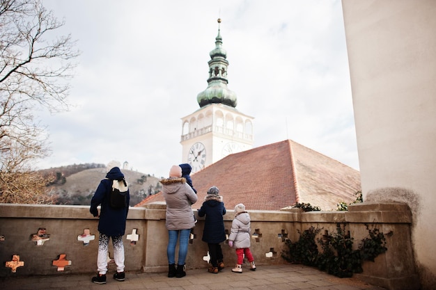 Family walking at historical Mikulov Castle Moravia Czech Republic Old European town