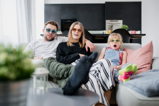 Family watching movie together