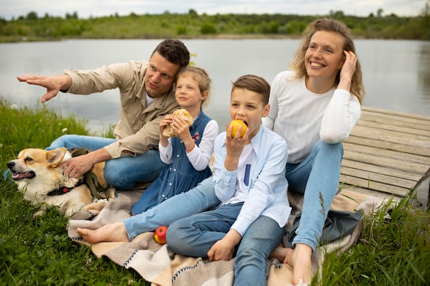 Family with dog outdoors