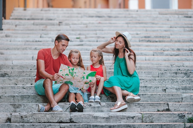 Family with kids on vacation in europe italy rome