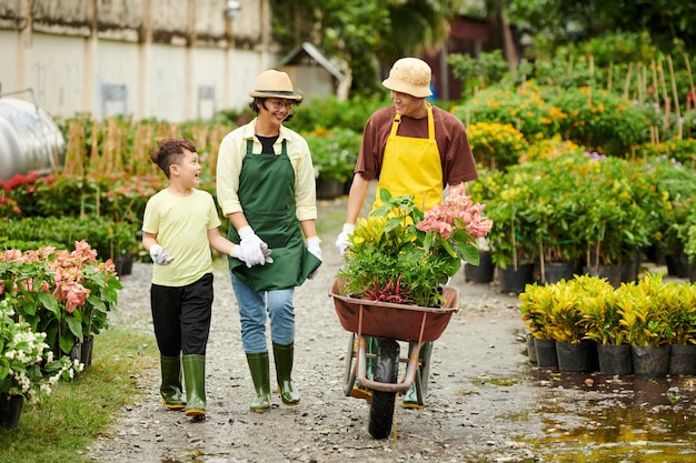 Family Working in Flower Garden