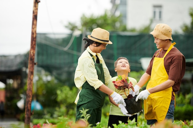 Family Working at Flower Nursery