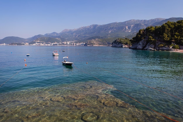 Famous architectural monument of the islandresort of St Stephen St Stephen in the Adriatic Sea Montenegro The concept of vacation at sea boat in the sea