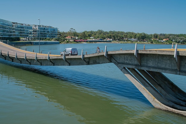 Famous wavy bridge in La Barra beach in Punta del Este