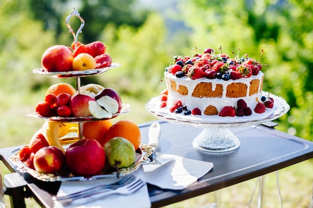 Fancy fruit cake Top view Delicious fruit plate outdoors Fine art style