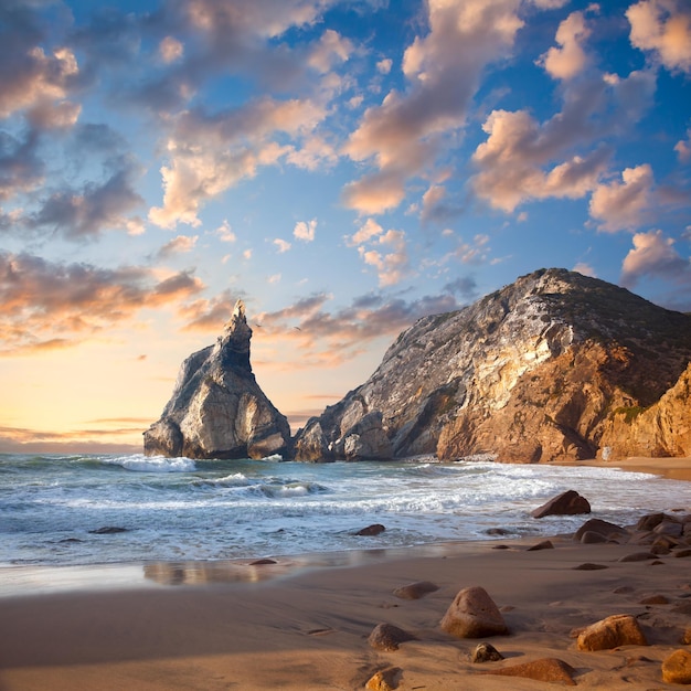 Fantastic big rocks and stones on the ocean beach at sundown Beauty world landscape Portugal Europe