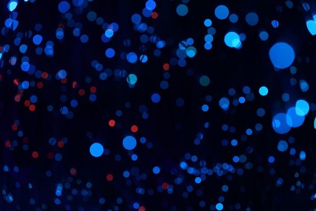 Fantastic blurry and bokeh dark blue theme background in the mystry cave