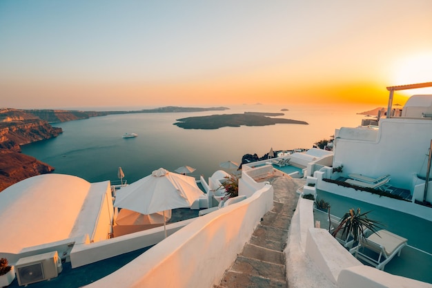 Fantastic evening urban view of Santorini island Greece. Picturesque autumn sunset famous travel