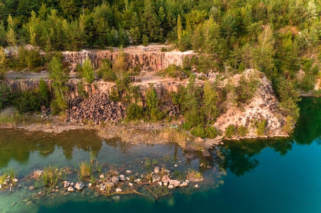 Fantastically beautiful landscape of basalt columns and azure lake in Ukraine