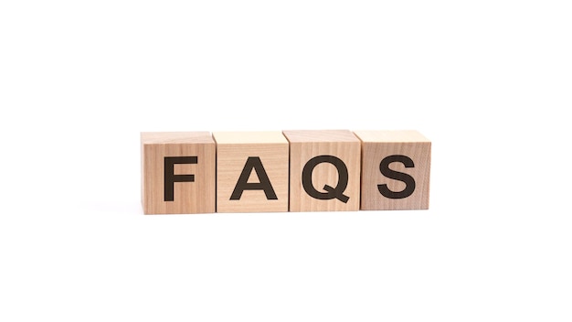 FAQS inscription on wooden cubes isolated on white background frequently asked questions concept