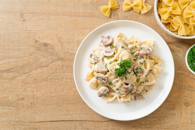 farfalle pasta with mushroom white cream sauce - Italian food style