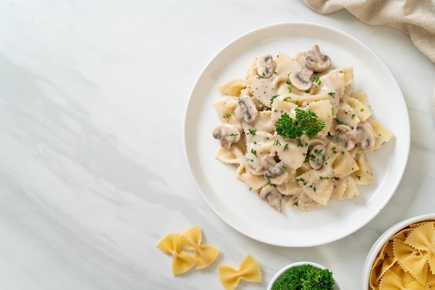 Farfalle pasta with mushroom white cream sauce