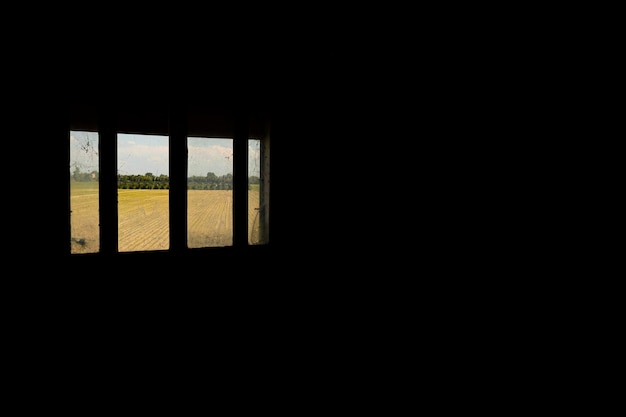 Farm Field Through Dirty Window