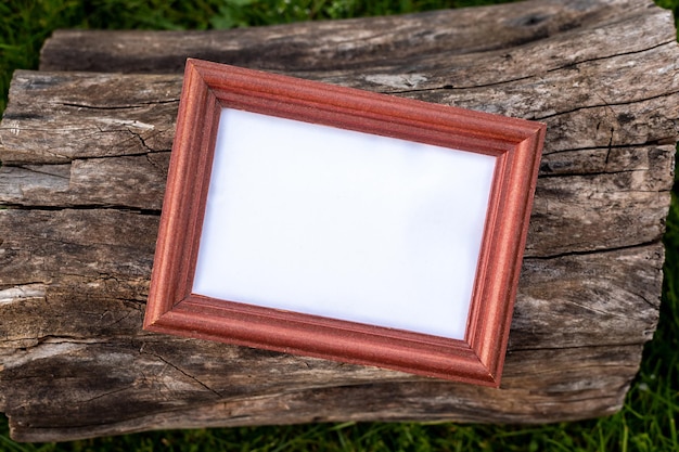 Farm mockup wooden frame on natural dark wood background