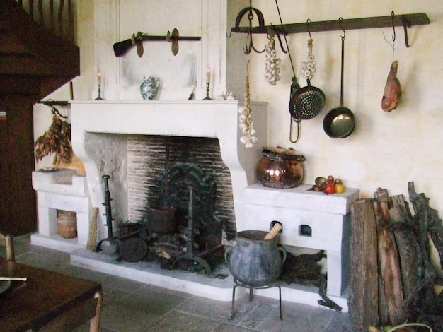 In a farm very old house with large fireplace