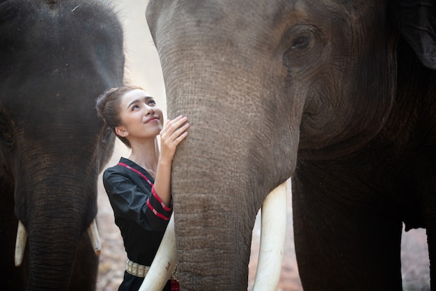 Farmer and elephant Asian culture