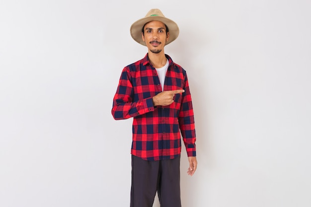 Farmer young black man with hat isolated in white background