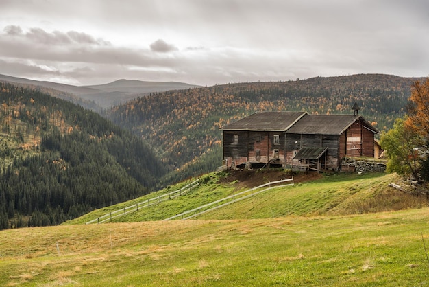 Farmhouse shed in autumn near Rondane National Park Norway