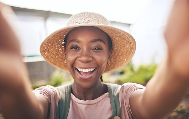 Farming smile and selfie of black woman in greenhouse sustainable small business and agriculture Portrait of happy farmer at vegetable farm agro career growth in summer and plants in Africa