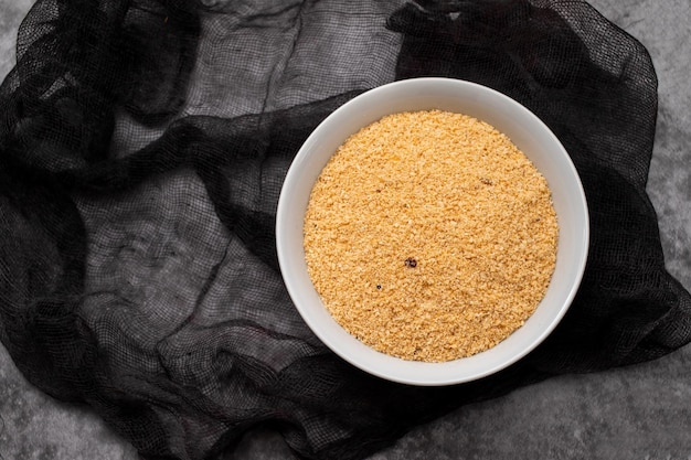 Farofa typical brazilian manioc flour side dish on ceramic